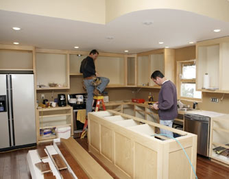 Kitchen installers at work